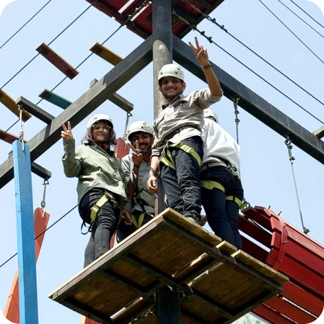 Corporate team bonding through outdoor obstacle activities