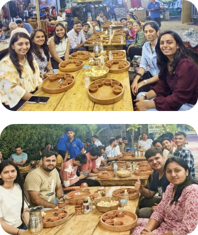 Team gathered around the dinner table enjoying great food and company