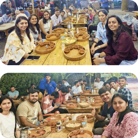 Team gathered around the dinner table enjoying great food and company