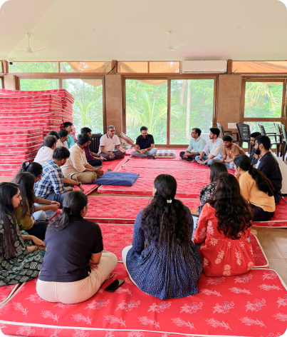 Team members in a guided meditation session
