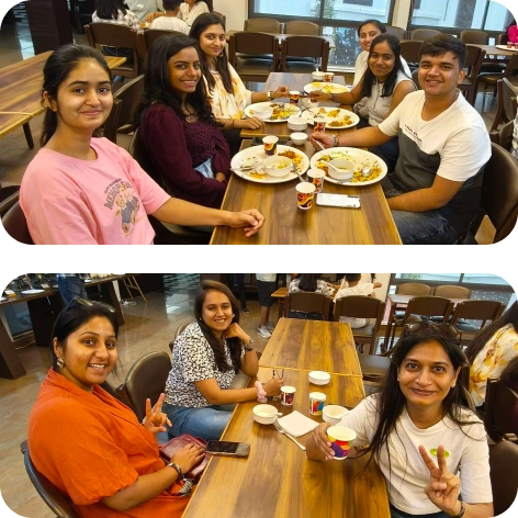 Smiling teammates posing on a high platform during outdoor retreat